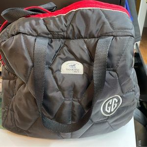 Show carry bag with padding and mesh bottom. All your stuff w/ no stray footing!